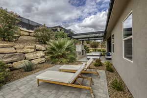 View of patio / terrace with outdoor seating and a pergola