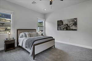 Bedroom featuring carpet floors, recessed lighting, and a ceiling fan