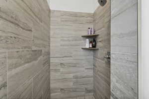 Bathroom with tiled shower