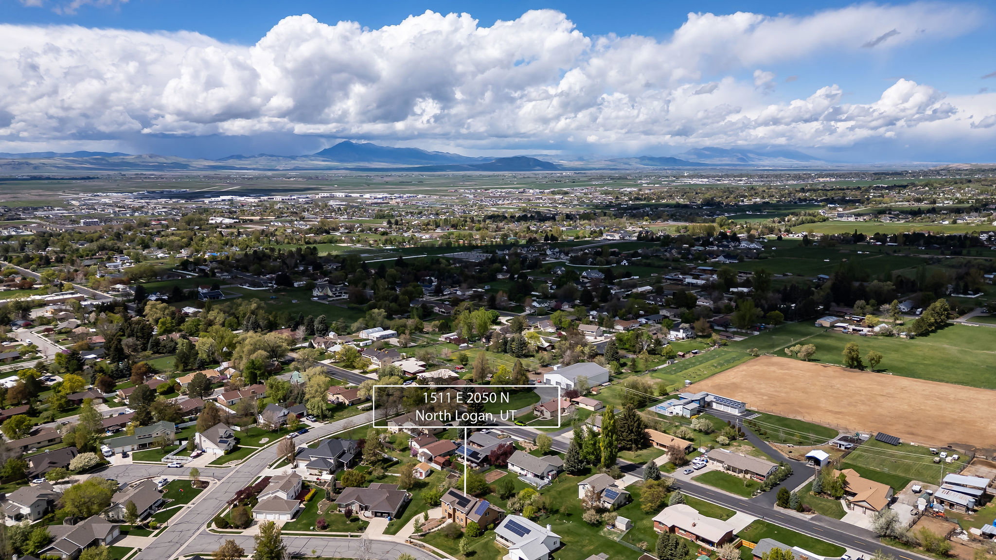 Aerial perspective of suburban area featuring mountains