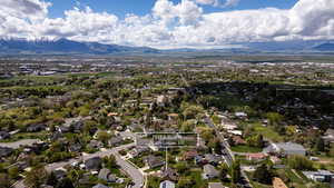 Aerial view of residential area with a mountainous background