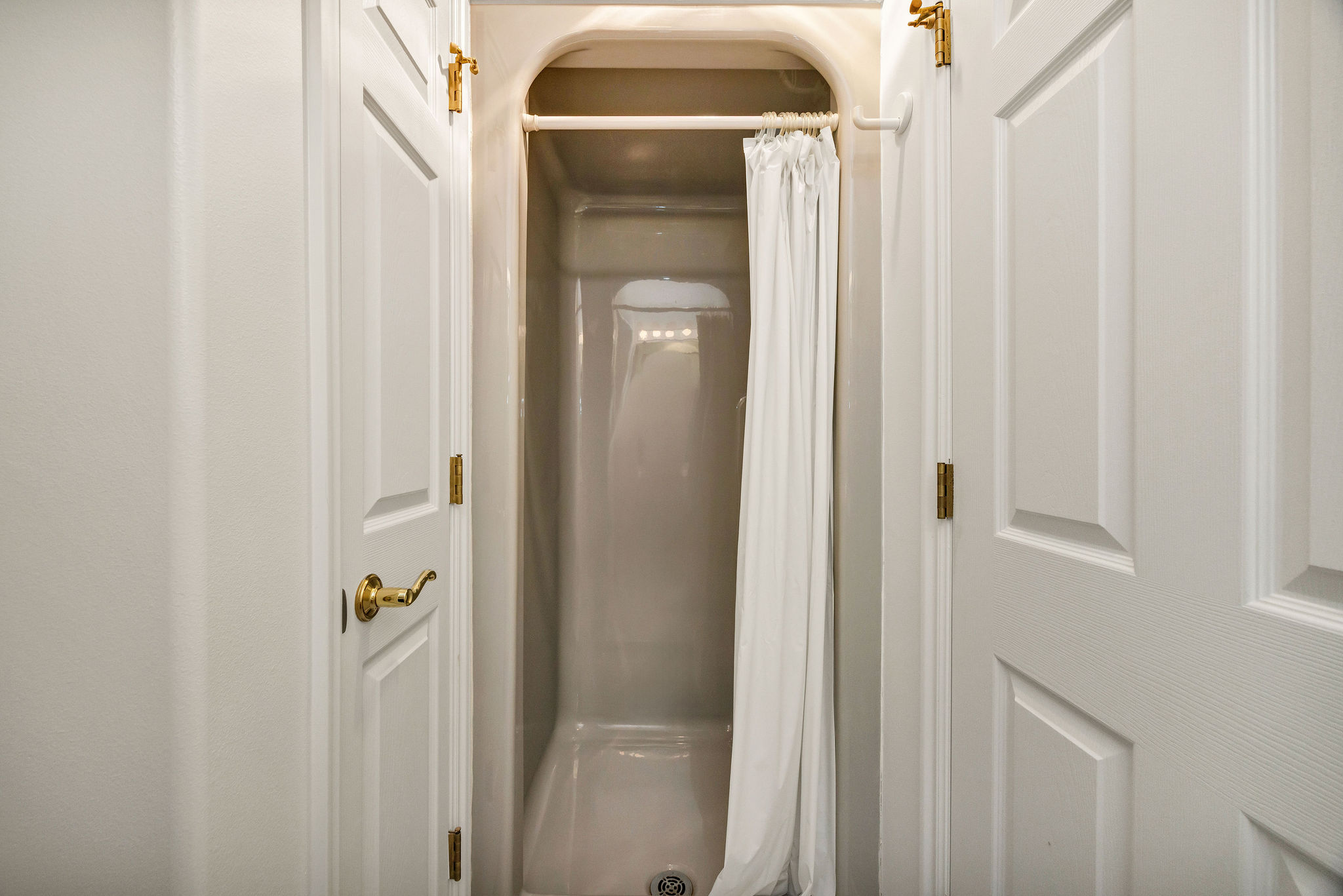Interior space with a shower stall