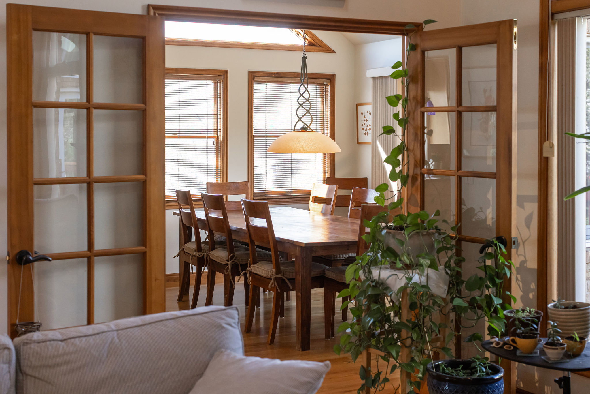 Dining room with healthy amount of natural light and wood finished floors