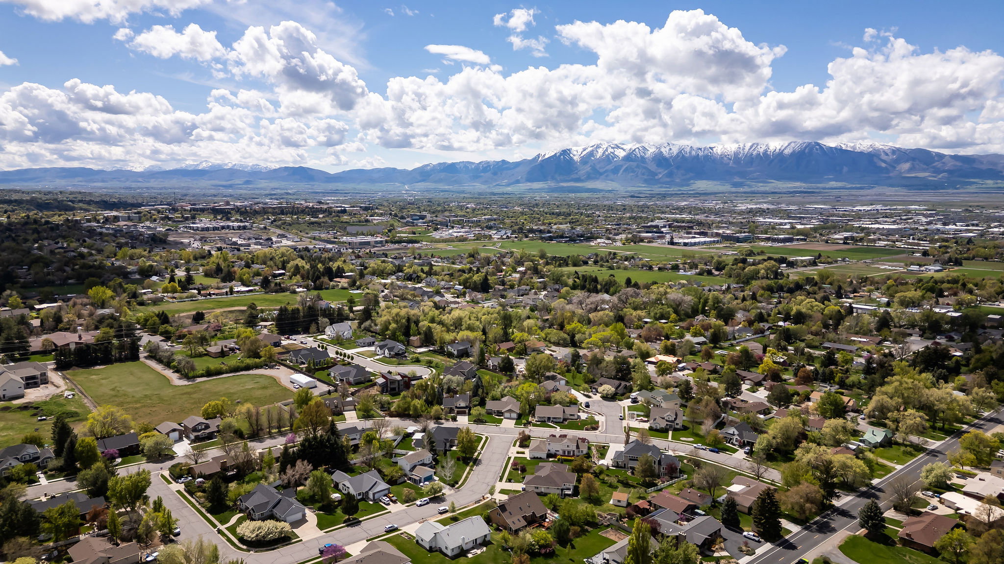 Aerial perspective of suburban area featuring mountains