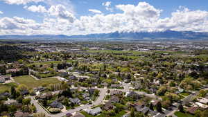 Aerial perspective of suburban area featuring mountains