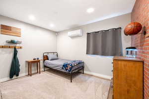 Bedroom featuring light colored carpet and recessed lighting