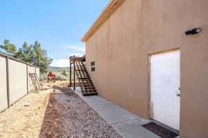 View of yard featuring stairway