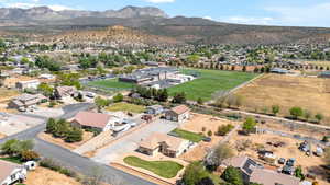 View of property location featuring a mountainous background and nearby suburban area
