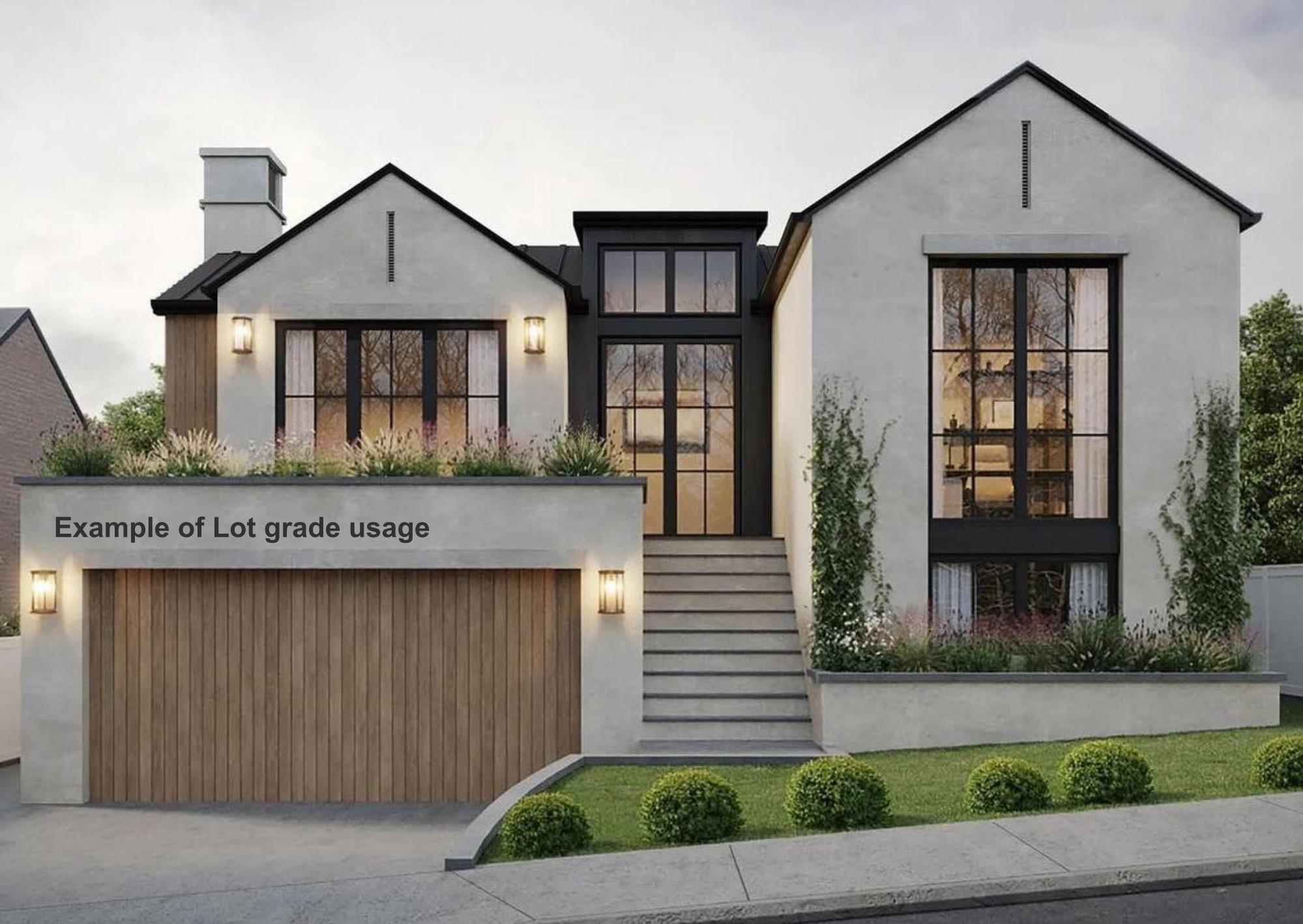 View of front facade featuring an attached garage, a chimney, driveway, and stucco siding