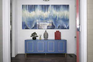 Detailed view of wood finished floors and baseboards