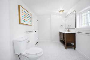 Ensuite bathroom. One of four total Bathrooms with toilet and vanity