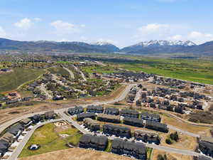 Aerial view of residential area featuring mountains