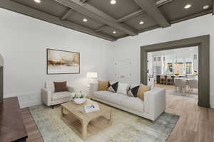 Living area with wood finished floors, recessed lighting, and coffered ceiling