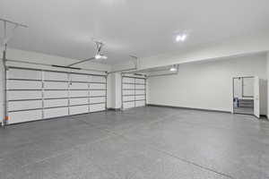 Garage featuring baseboards