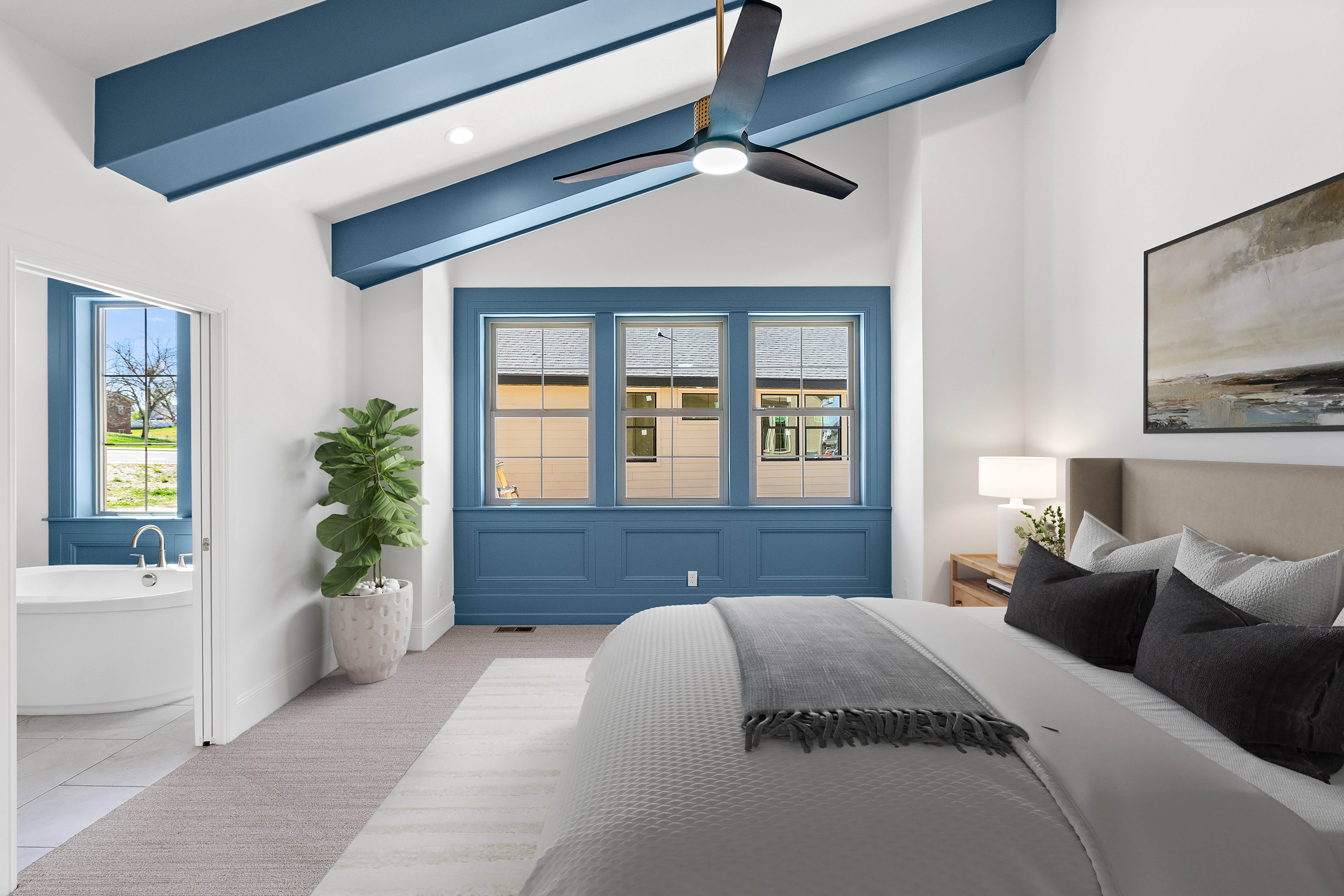 Carpeted bedroom with vaulted ceiling, a ceiling fan, recessed lighting, and tile patterned flooring