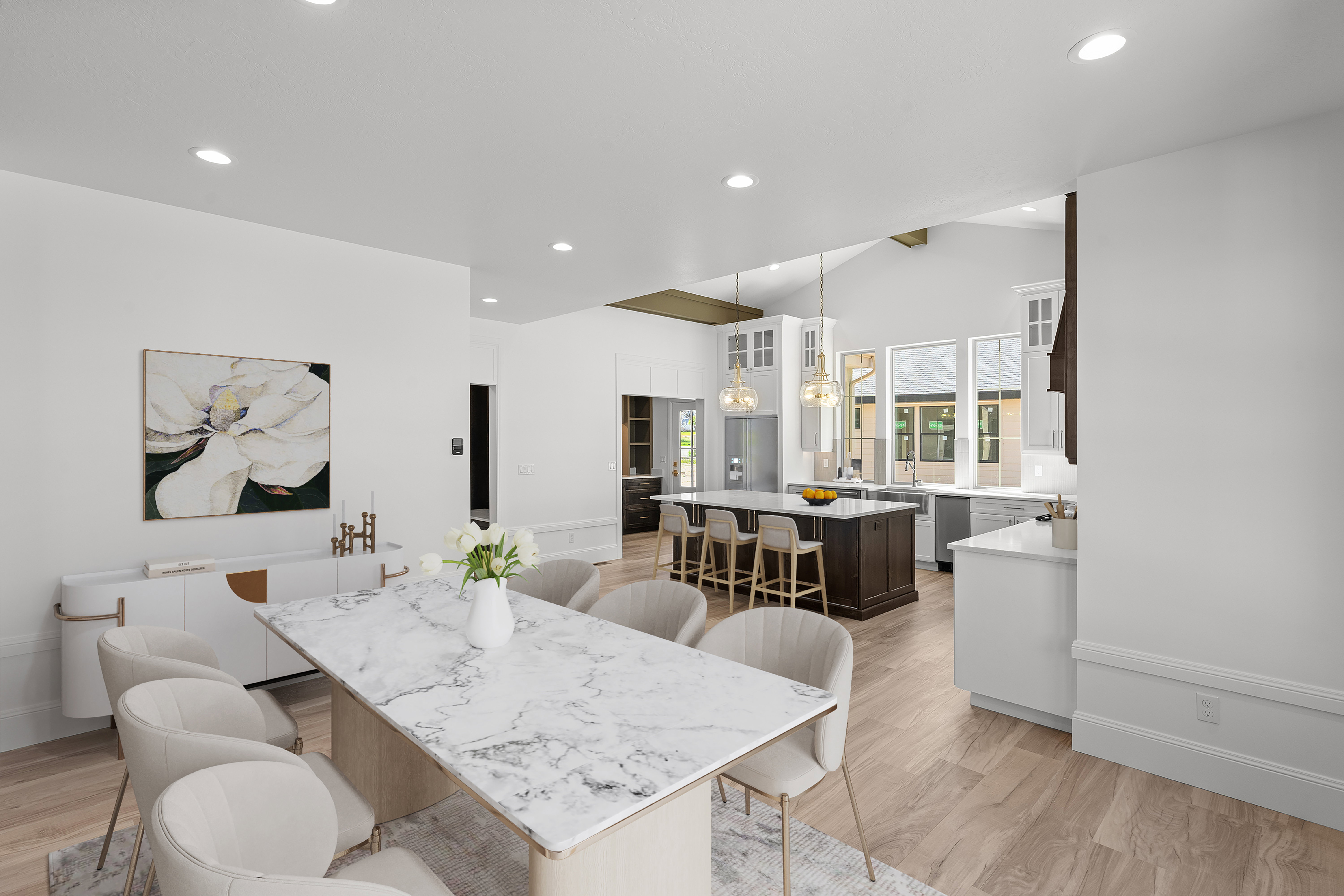Dining room featuring light wood-style floors, recessed lighting, and lofted ceiling