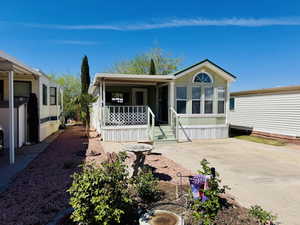 Manufactured / mobile home featuring covered porch