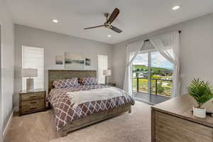 Bedroom with light colored carpet, access to exterior, a ceiling fan, and recessed lighting