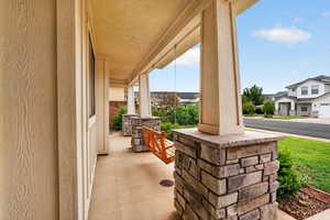 Front Porch with Swing, Covered porch featuring a residential view