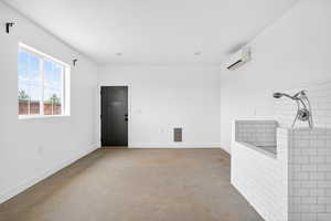 Bonus Space with a wall mounted mini split, custom dog grooming tub/? with its own entry. Think outside the box with this one.
