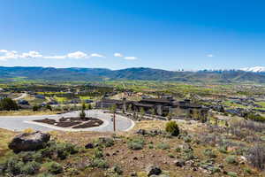 View of mountain backdrop with nearby suburban area