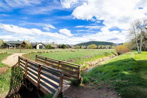 View of community featuring a mountain view and a view of countryside