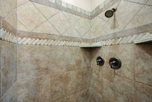 Bathroom view of a tile shower