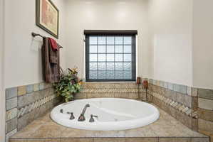 Bathroom featuring a jetted tub