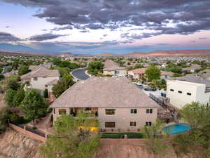 Aerial view at dusk of a residential view and a mountain view