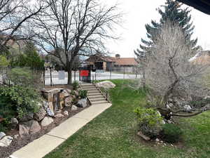 View of yard featuring stairway