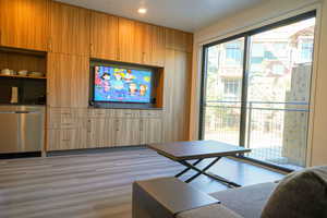 Living area featuring light wood-style floors
