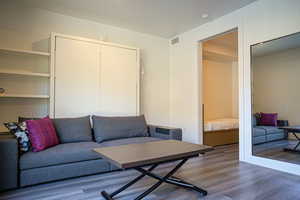 Living area with wood finished floors