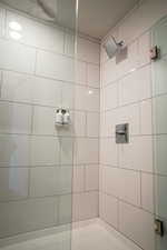 Full bath with a shower stall