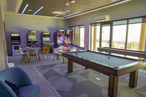 Recreation room with billiards table