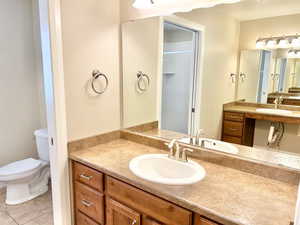 Bathroom featuring vanity and light tile patterned floors