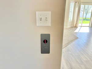 Detailed view of wood finished floors and baseboards