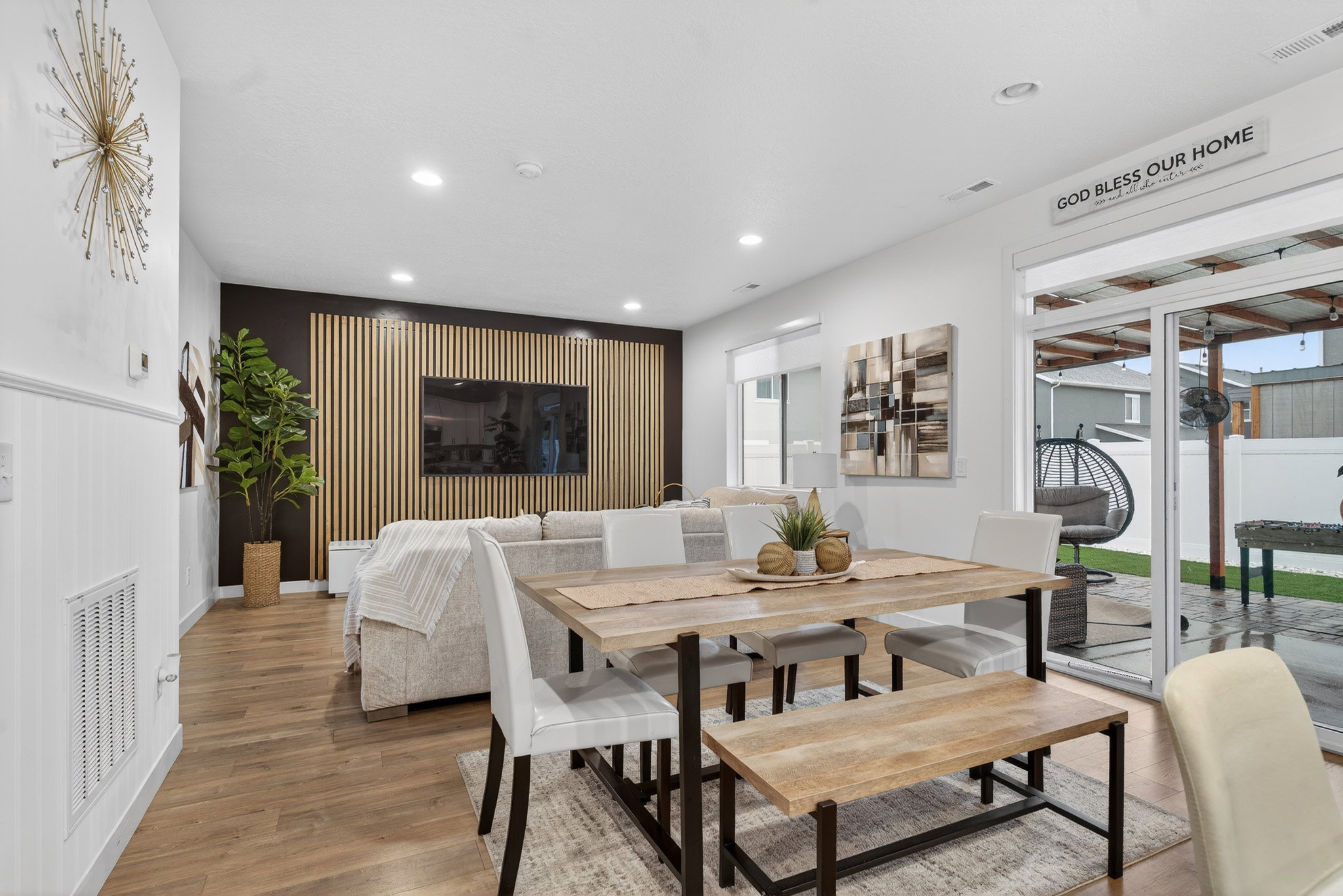 Dining space featuring light wood-style floors and recessed lighting
