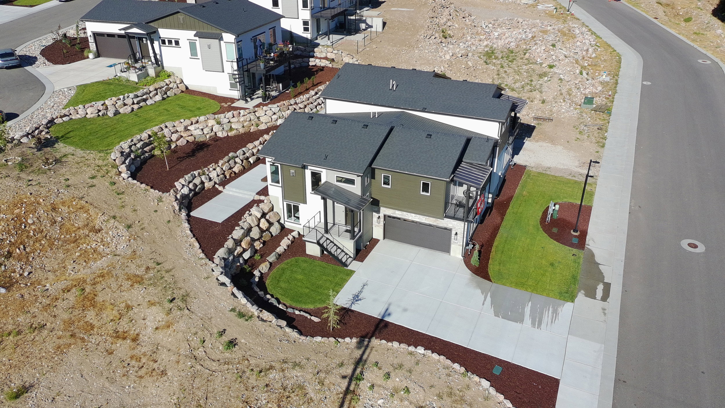 Contemporary two-story residence with an attached two-car garage