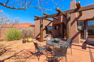 View of patio featuring outdoor dining space and a mountain view