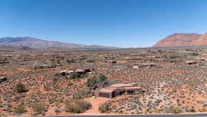 View of mountain backdrop featuring a desert landscape and rural landscape