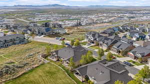 Aerial perspective of suburban area with a mountain backdrop
