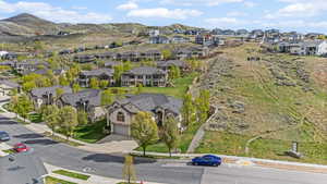 Aerial view of residential area with a mountainous background