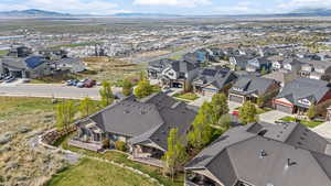 Aerial perspective of suburban area with a mountainous background
