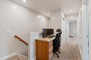 Office featuring light carpet and recessed lighting