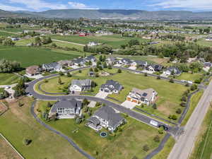 View of property location featuring a mountainous background and nearby suburban area