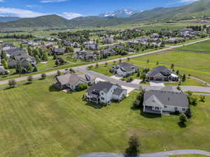 Aerial view of residential area with a mountainous background