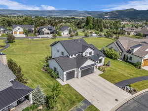 Aerial view of residential area with a mountain backdrop