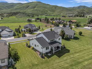 Aerial view of residential area featuring mountains