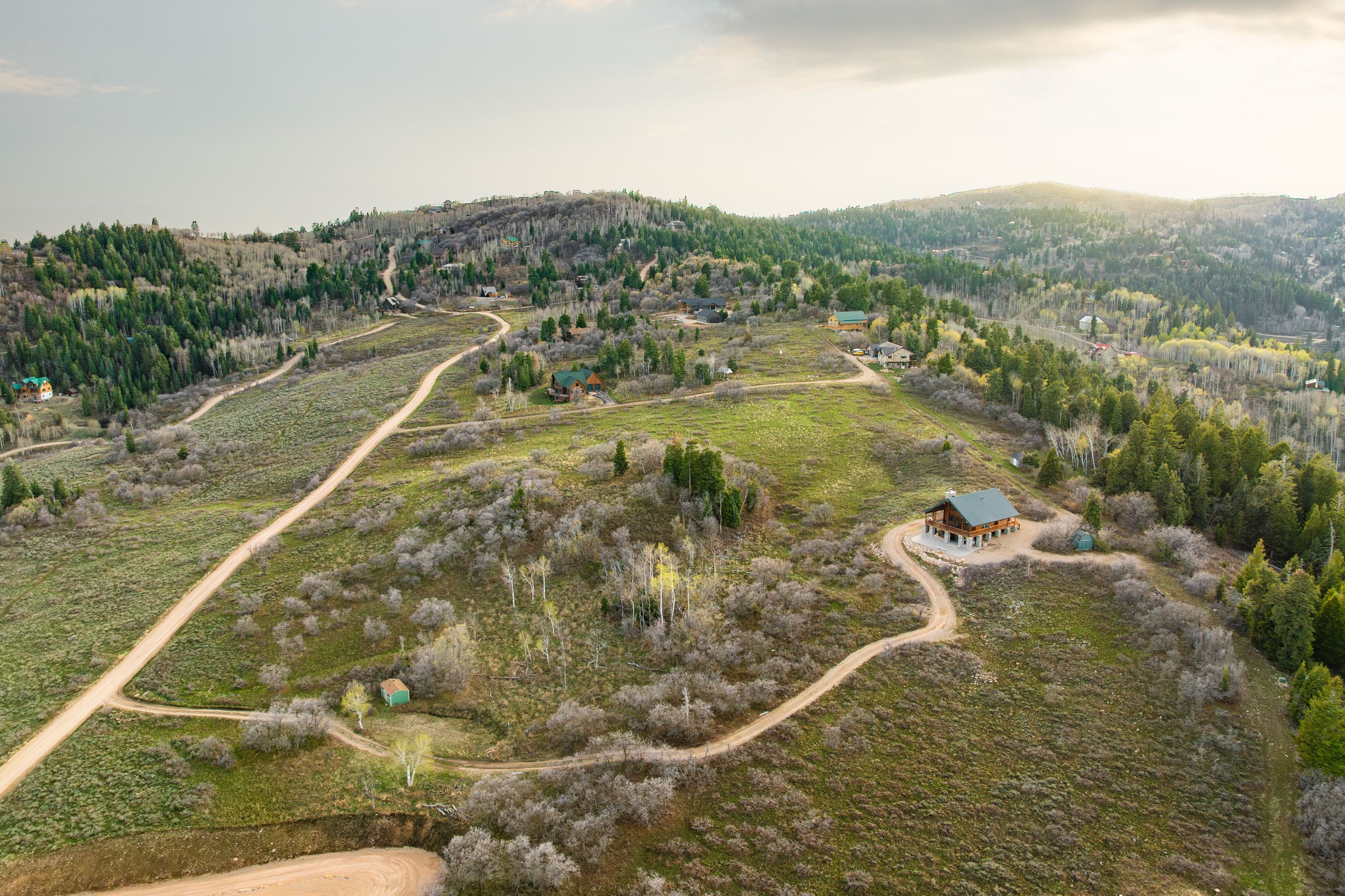 Overview of rural landscape with a heavily wooded area