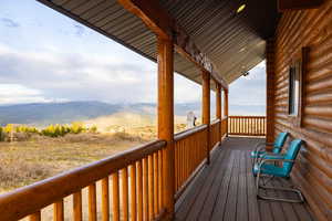 Deck featuring a mountain view